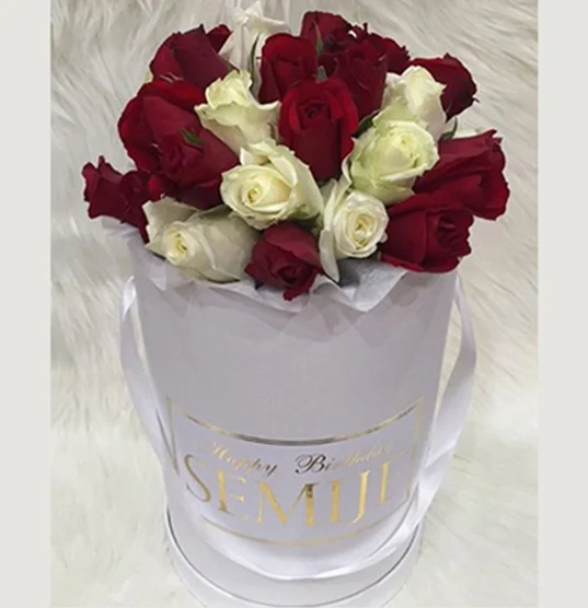 Mixture of Red and White roses, with white box